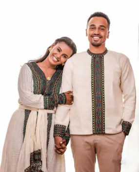 Embracing Tradition in Dark Tilet Habesha Couples Outfit